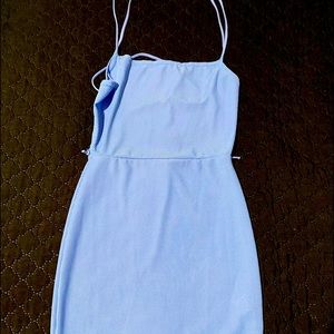 Baby blue strappy dress.